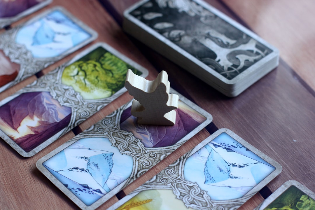 a-group-of-cards-on-a-table-f7z4ej3pnrw